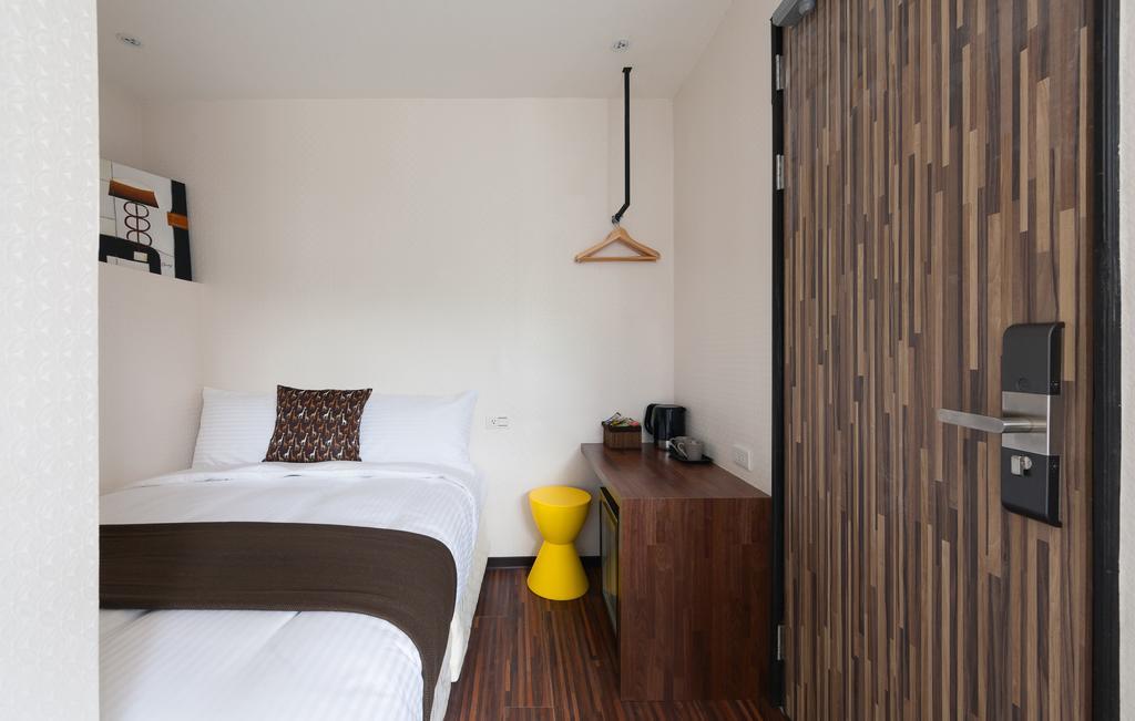 Herb Art Hotel Цзілун Номер фото